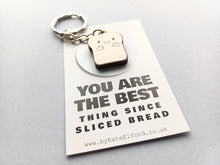 Load image into Gallery viewer, Sliced bread keyring - Positive keyring - Ethically sourced wood - Small wooden keyring - Unique gift idea - Motivational keyring
