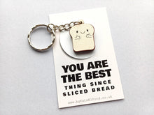 Load image into Gallery viewer, Sliced bread keyring - Positive keyring - Ethically sourced wood - Small wooden keyring - Unique gift idea - Motivational keyring
