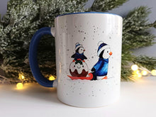 Load image into Gallery viewer, Christmas Penguins mug - Ceramic Mug - Winter Penguin Design - Dishwasher Safe Mug - Blue Handle Mug - Cute Penguin Gift
