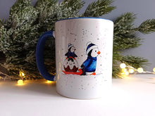 Load image into Gallery viewer, Christmas Penguins mug - Ceramic Mug - Winter Penguin Design - Dishwasher Safe Mug - Blue Handle Mug - Cute Penguin Gift

