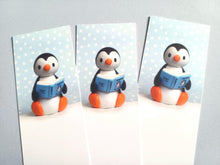 Load image into Gallery viewer, Penguin reading a book about penguins bookmark
