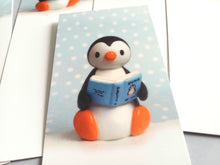 Load image into Gallery viewer, Penguin reading a book about penguins bookmark
