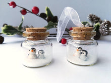 Load image into Gallery viewer, Miniature penguin Christmas decoration. Little pottery penguins and chick in a glass bottle. Christmas penguin mini ornament, mothers day
