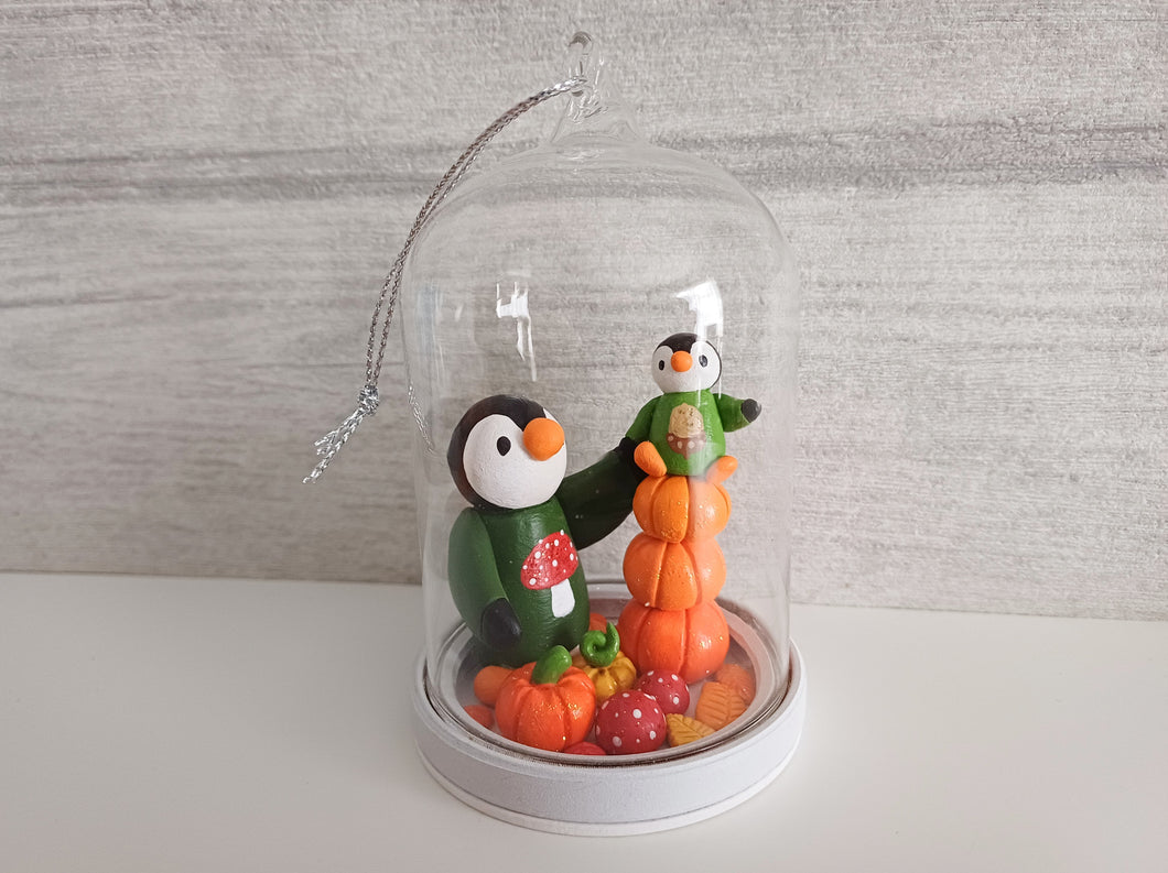 Penguin and chick autumn glass dome
