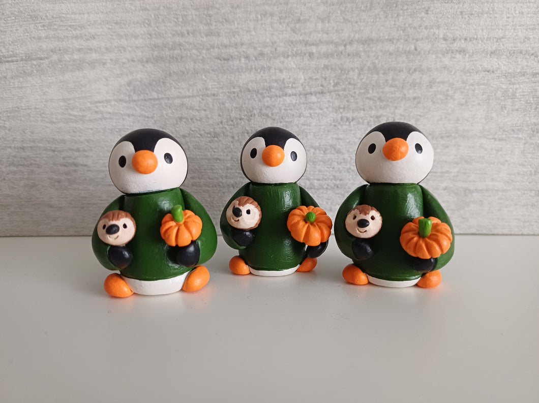 Penguin, pumpkin and hedgehog