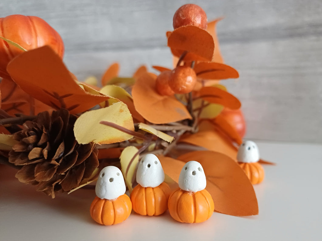 Miniature ghost and pumpkin