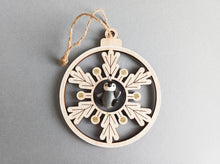 Load image into Gallery viewer, Wooden snowflake and penguin
