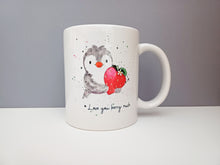 Load image into Gallery viewer, A white mug with a penguin holding a strawberry with the wording I love you berry much 
