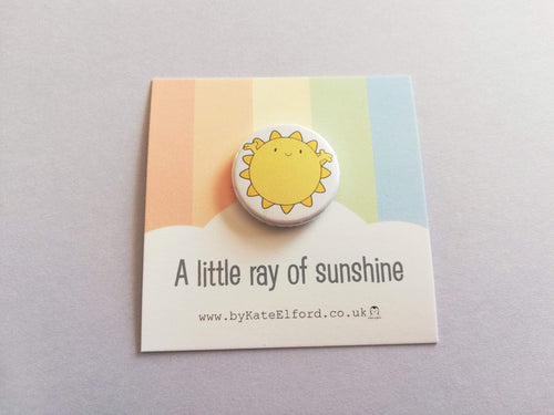 A little ray of sunshine button badge