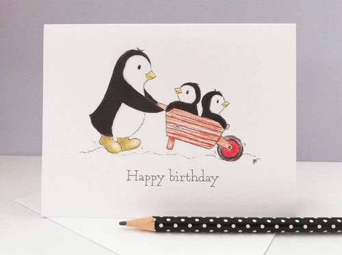 Cute penguins in a wheelbarrow birthday card