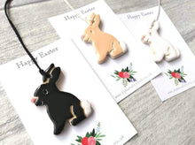 Load image into Gallery viewer, Set of three pottery Easter bunny ornaments
