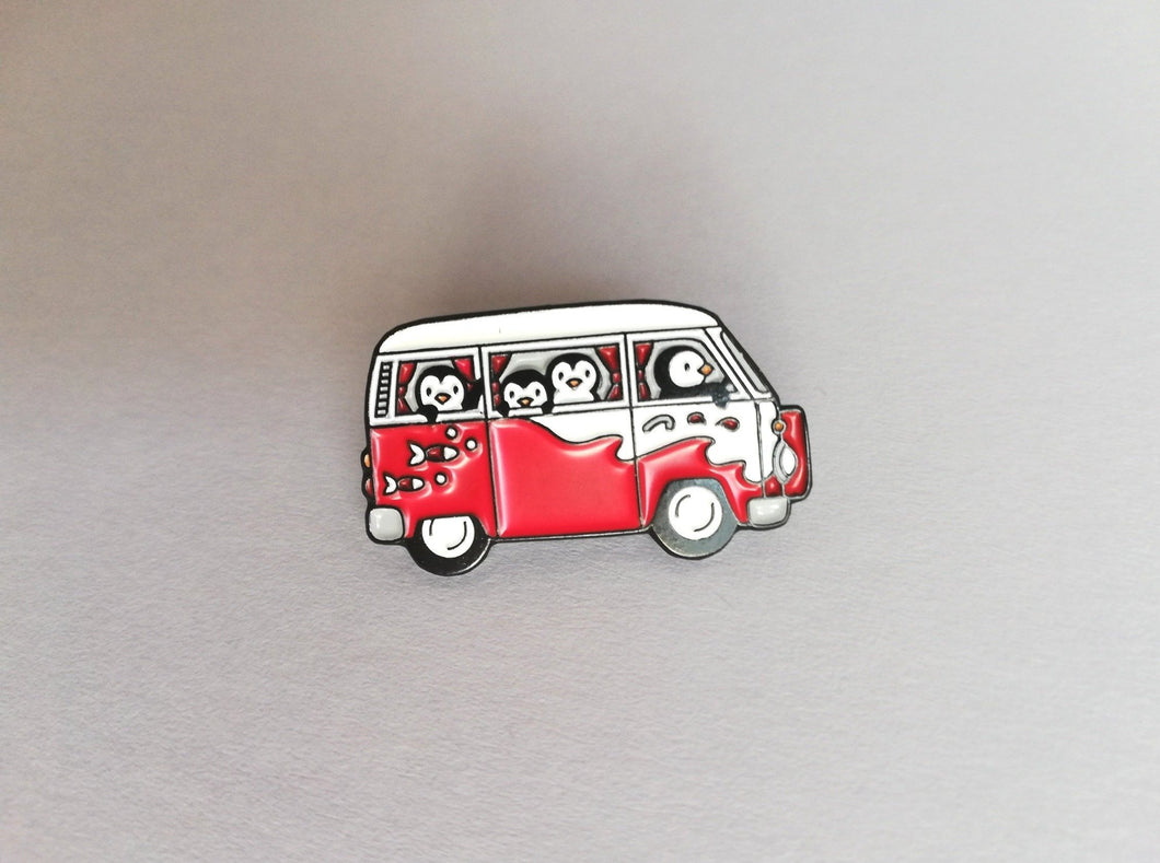Red mini camper van and penguins enamel badge