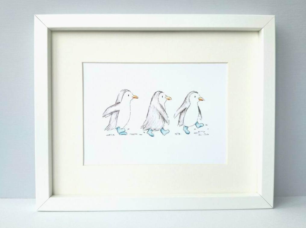 Three grey penguins wearing blue boots and splashing in the puddles, 7 x 5 inch print
