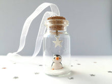 Load image into Gallery viewer, Miniature penguin decoration. Little pottery penguin in a glass bottle. Christmas penguin mini ornament
