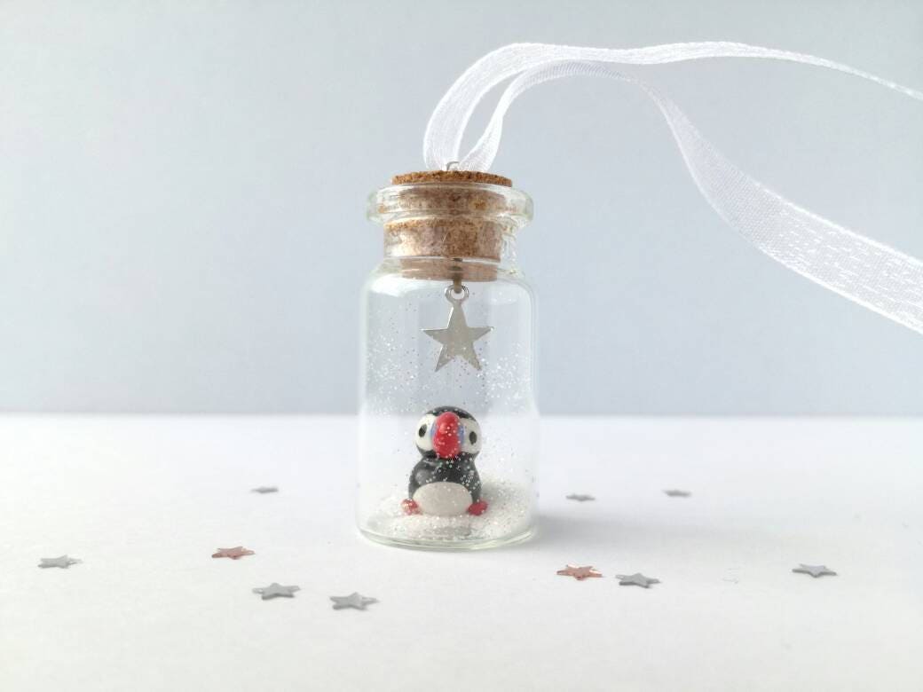 Puffin Christmas decoration. Little pottery puffin in a miniature glass bottle. Mini Christmas puffin ornament