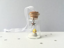 Load image into Gallery viewer, Cockatiel Christmas decoration. Little pottery cockatiel in a miniature glass bottle. Mini Christmas grey and yellow bird ornament

