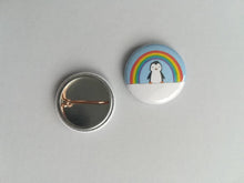 Load image into Gallery viewer, Back and front of a penguin and rainbow button badge 
