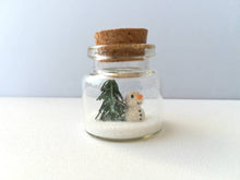Load image into Gallery viewer, Miniature snowman Christmas decoration. Little pottery snowman and tree in a glass bottle. Christmas mini ornament
