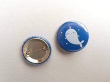 Load image into Gallery viewer, Back and front of a mini narwhal badge
