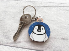 Load image into Gallery viewer, Penguin chick keyring. Wooden key fob, blue starry night, penguin key chain, wood bag charm, responsibly resourced wood
