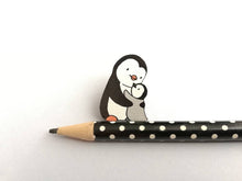 Load image into Gallery viewer, Penguin and chick wooden pin brooch, Mum and baby cute little penguin badge. Responsibly resourced wood.
