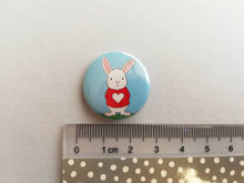 Load image into Gallery viewer, Rabbit badge, mini white rabbit badges, little bunny pin button. Red love heart jumper.
