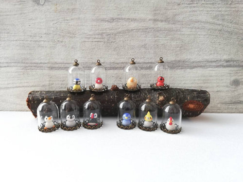 Miniature bird glass domes. Pottery penguin, owl, cockatiel, robin, blue tit, chicken, puffin, or gold finch. Mini taxidermy style.