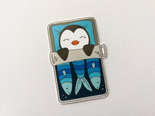Load image into Gallery viewer, Penguin vinyl sticker, sleeping penguin sticker, sardine tin bed sticker

