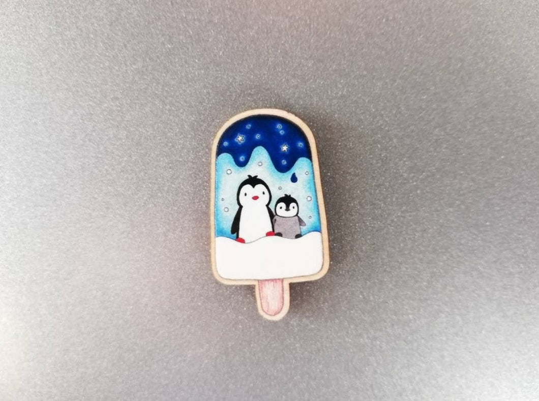 Mini ice lolly shaped fridge magnet, with two penguins
