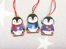 Load image into Gallery viewer, Penguin Christmas decorations. Set of three wooden penguins. Christmas jumper, deer, snowman, santa. Cute Christmas tree ornaments.
