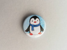 Load image into Gallery viewer, Mini button badge, a little penguin wearing a blue scarf

