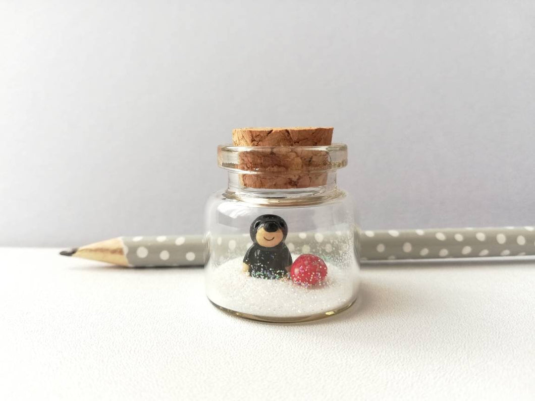 Miniature mole and red toadstool Christmas ornament. Little glass bottle and pottery mole. Christmas woodland mini ornament