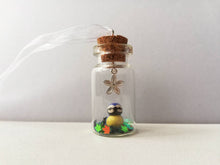 Load image into Gallery viewer, Miniature blue tit ornament. Little pottery bird in a glass bottle. Mini ornament and flower.
