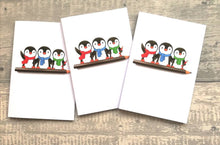 Load image into Gallery viewer, A6 notebook, cute penguins sat on a pencil. Small lined notepad
