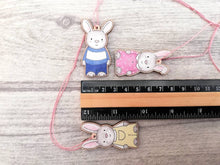 Load image into Gallery viewer, Easter bunny decorations. Set of three little wooden rabbits. Cute wooden Easter tree ornaments. Rabbit hanger, grey bunny tags.
