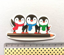 Load image into Gallery viewer, Penguins and pencil sticker, artist, writer penguin sticker, eco friendly sticker
