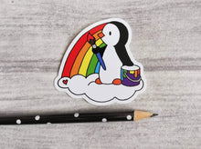 Load image into Gallery viewer, Penguin painting a rainbow, artist penguin sticker
