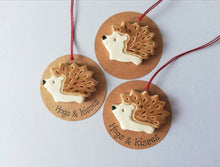 Load image into Gallery viewer, Pottery hedgehog hanger. Little hedgehog tag. Hand painted ceramics, hogs and kisses

