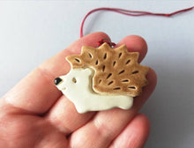 Load image into Gallery viewer, Pottery hedgehog hanger. Little hedgehog tag. Hand painted ceramics, hogs and kisses
