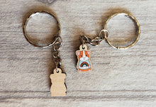 Load image into Gallery viewer, Little guinea pig keyring, cute mini piggy, rainbow jumper wooden key chain, ethically sourced wood, eco friendly charm
