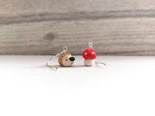 Load image into Gallery viewer, Hedgehog and toadstool earrings, ceramic, miniature hedgehogs, mini hogs, tiny mushroom, mis matched autumn sterling silver earrings.
