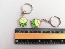 Load image into Gallery viewer, A little blob of luck keyring, mini good luck key fob, four leaf clover, postable, supportive, care recycled acrylic
