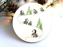 Load image into Gallery viewer, Penguin chicks playing in the snow illustrated coaster
