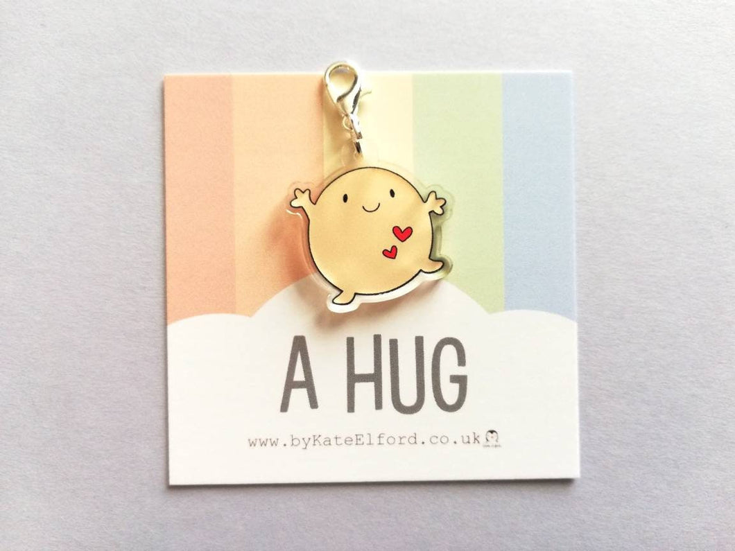 A hug stitch marker, cute positive charm, friendship, postable hug, supportive, recycled acrylic