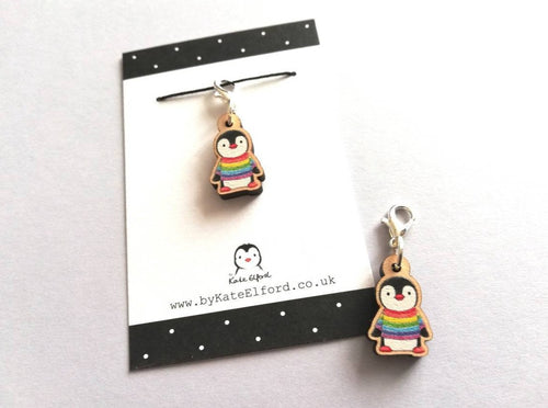 Small wooden stitch marker, little penguin design wearing a rainbow striped jumper