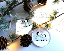 Load image into Gallery viewer, Penguin and polar bear decoration. Little recycled acrylic Christmas ornament, penguin and bear in the snow, eco friendly

