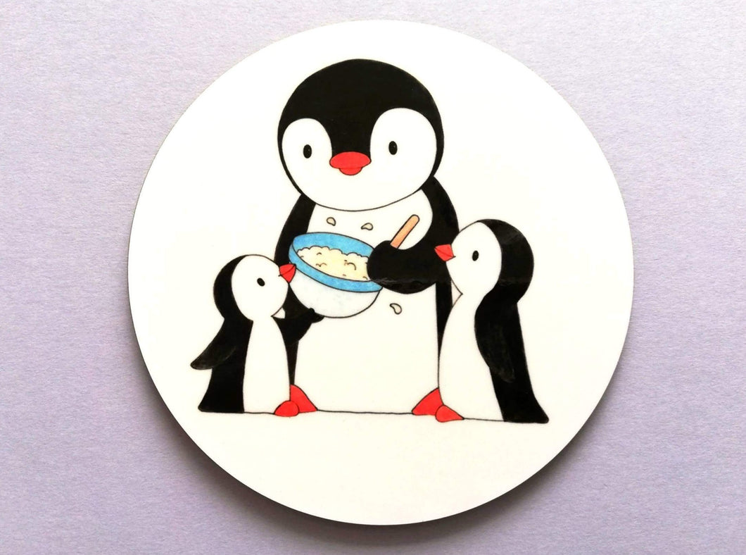 Penguins baking with a mixing bowl coaster
