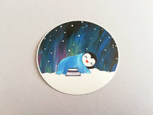 Load image into Gallery viewer, Penguin asleep under the stars sticker, Northern lights, aurora reading, book sticker
