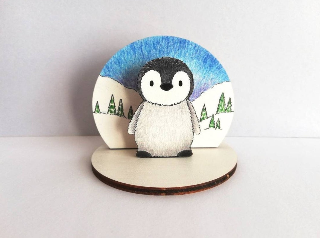 Penguin chick wooden ornament, little wood standee. Ethically sourced wood, penguin in the snow