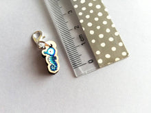 Load image into Gallery viewer, Seahorse stitch marker, mini blue seahorse wooden charm, ethically sourced wood, little crochet stitch marker
